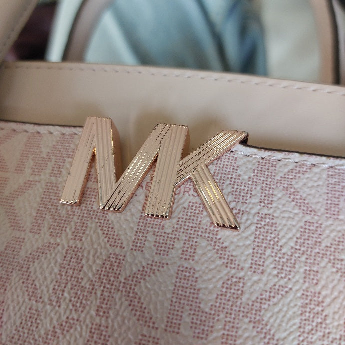 Michael Kors Light Pink Monogrammed MD Messenger Bag | Pre Loved |