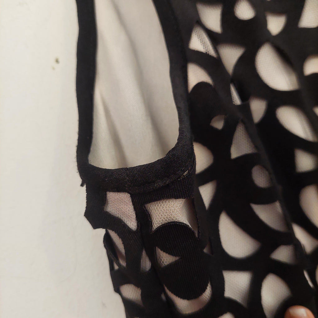 Xscape Black & White Cut-out Knee Length Dress | Gently used |